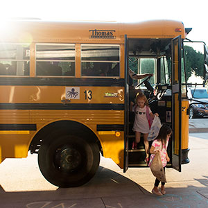Children Disembarking from Thomas Built Bus