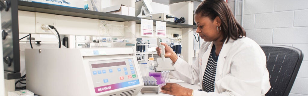 Woman in Biomedical Lab
